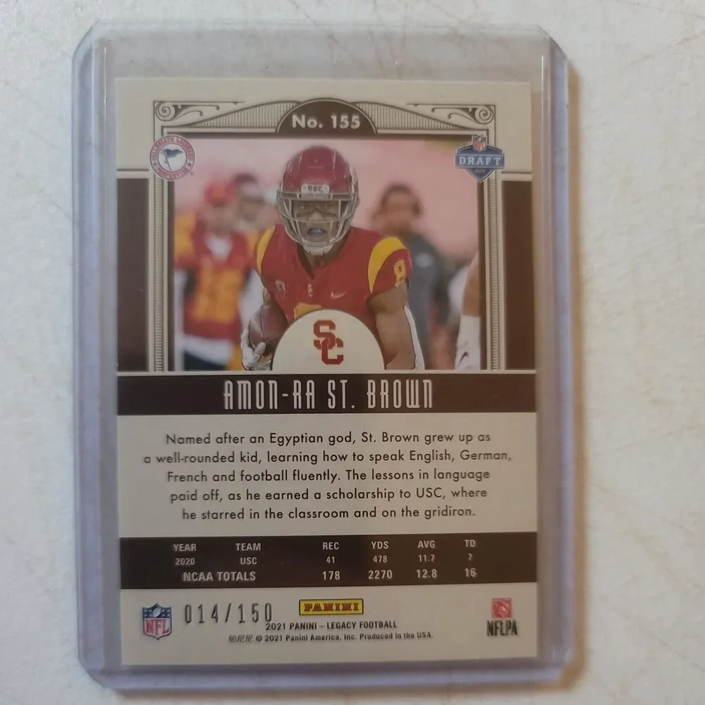 2021 Panini Legacy - Rookies Amon-Ra St. Brown #155 Yellow 14/150 (RC)